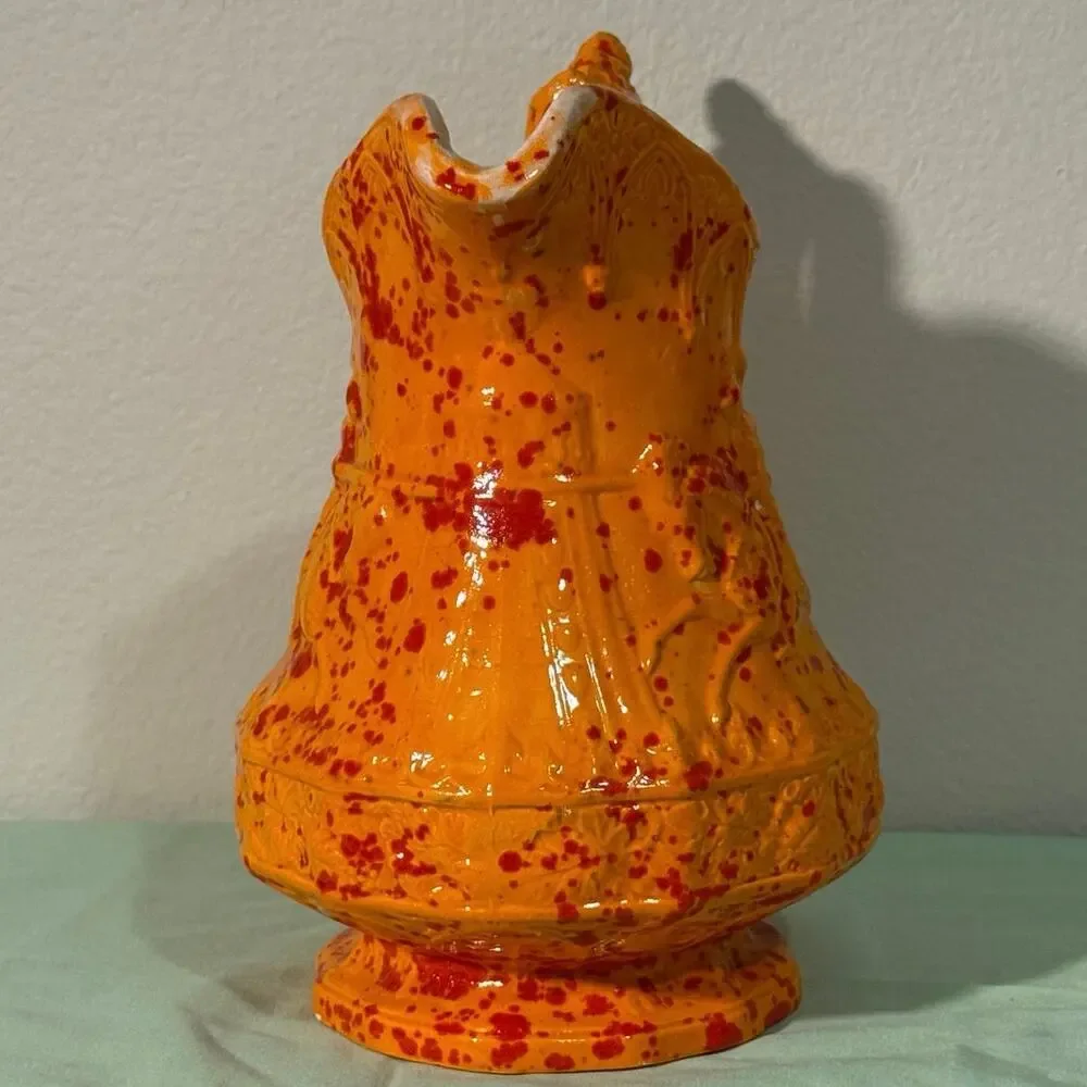 Vintage Medieval design ceramic mold pitcher. Knights jousting. 1979.